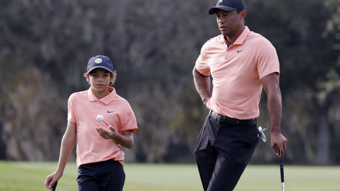 Smiling Tiger Woods happy with return at PNC Championship with son Charlie